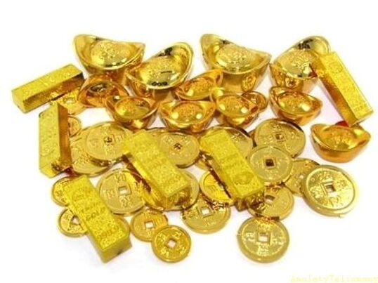 золотые слитки и монеты как талисманы
